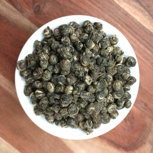 buddhas tears white tea / jasmine pearls tea