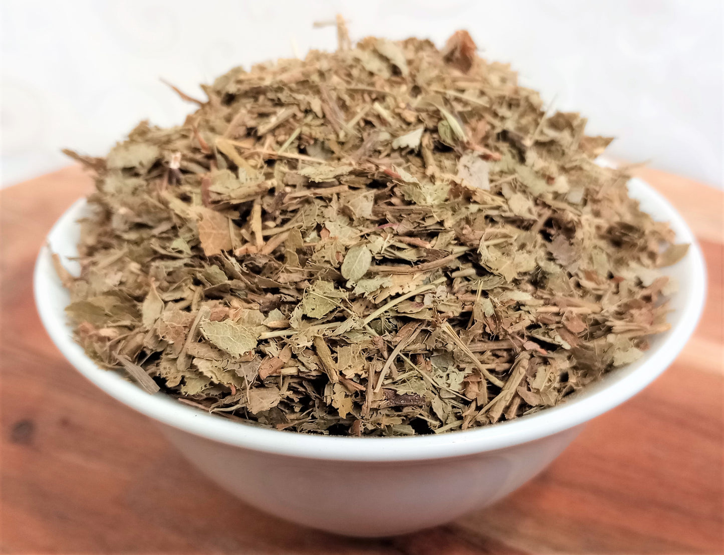 dried billberry leaf in a small bowl