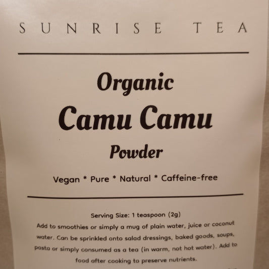 Bag of Organic Camu Camu Powder with branding and product details.