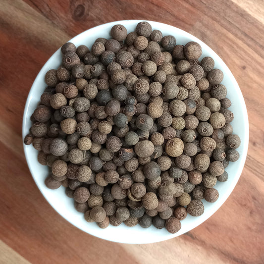 all spice or pimento berries in a bowl