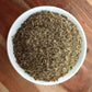 dried basil leaf in bowl