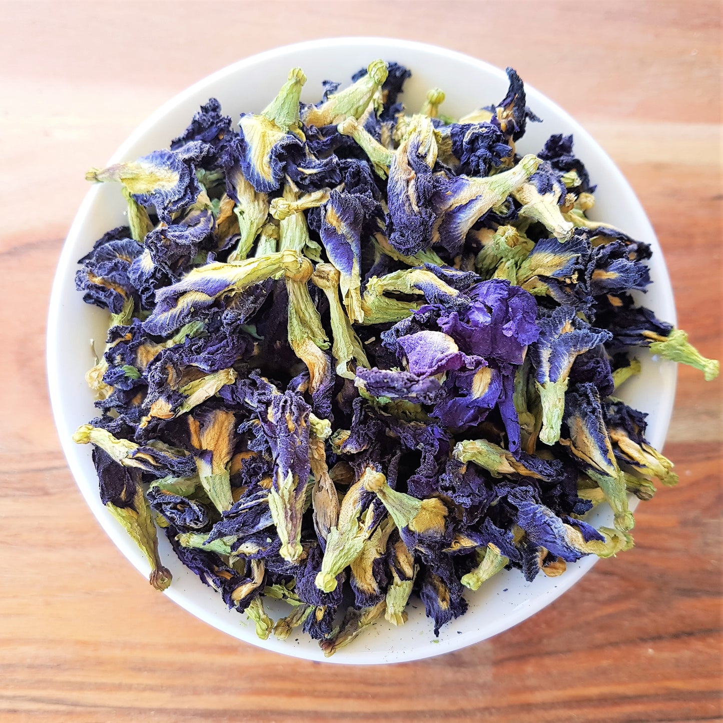 organic butterfly pea flowers in bowl