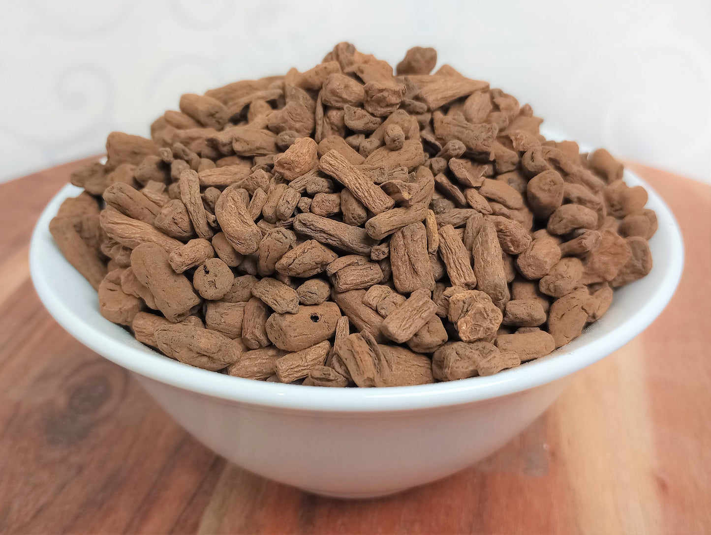 dandelion root roasted in white bowl