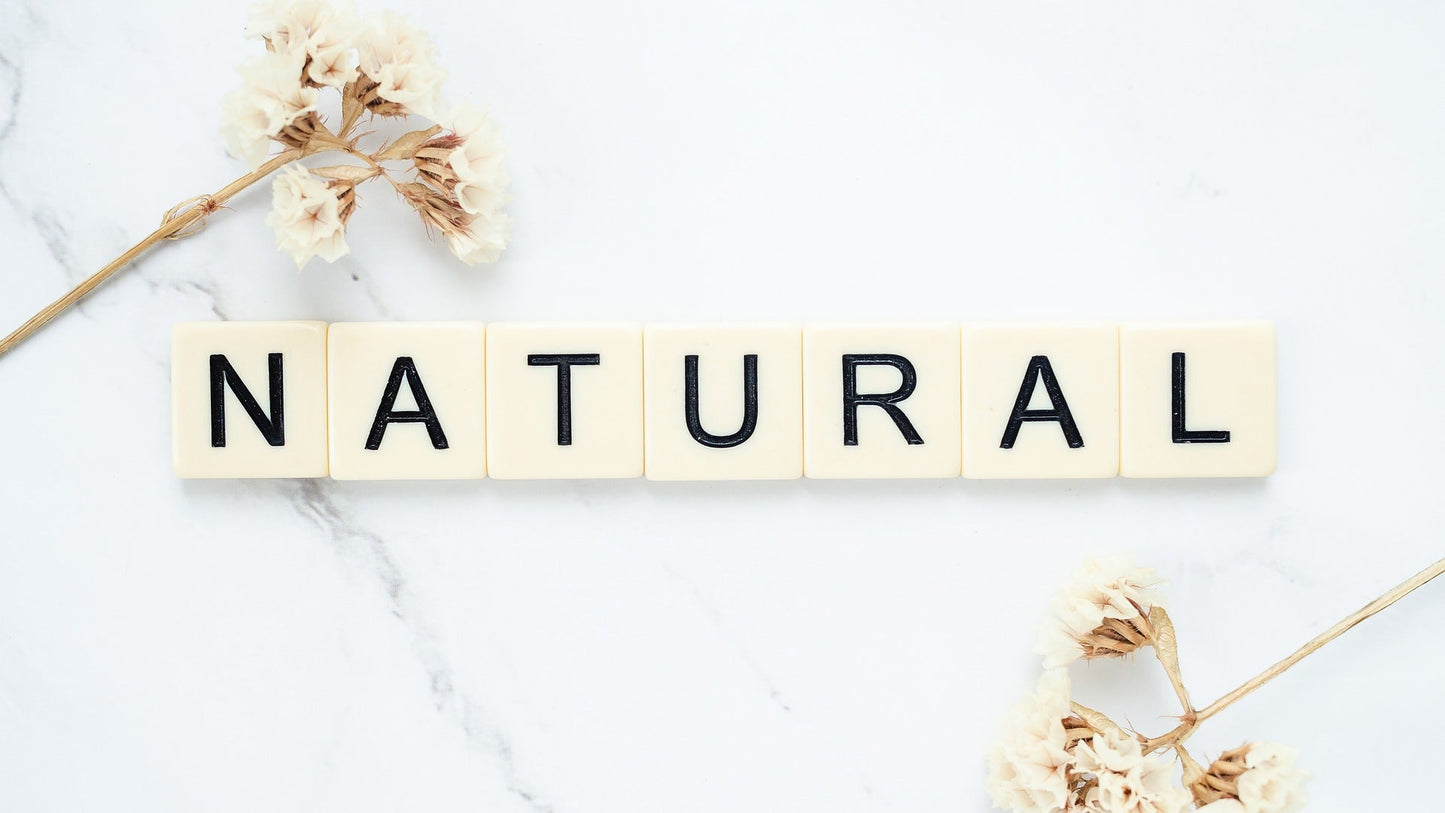 the word NATURAL spelt out using Scrabble letters