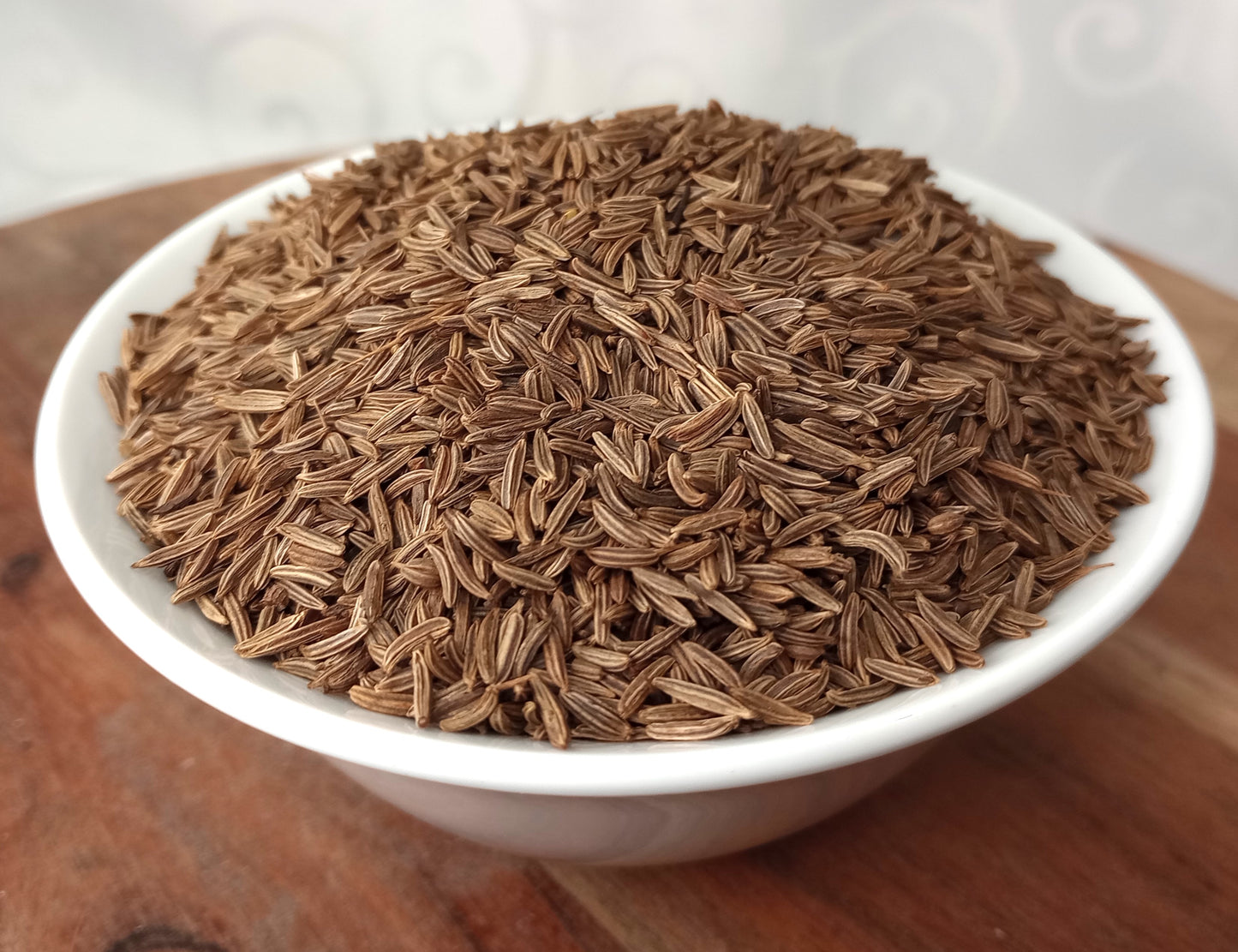 organic caraway seeds in a bowl close up