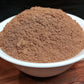 organic true or Ceylon cinnamon powder in bowl close up