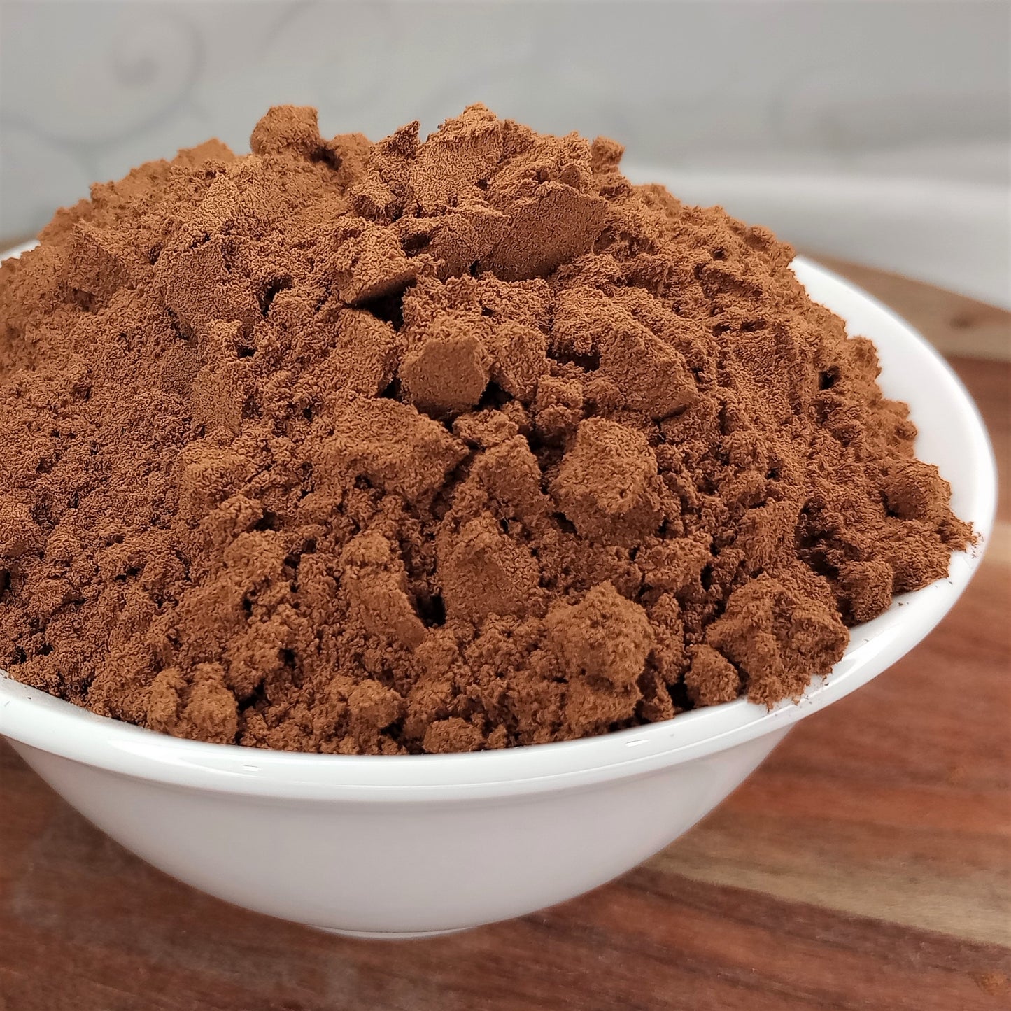 organic cloves powder in bowl close up