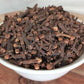 organic cloves in bowl