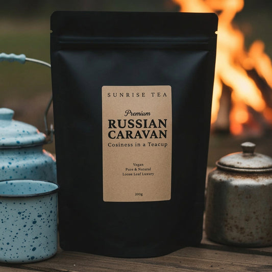 Black tea package labeled 'Russian Caravan' with a fireplace in the background