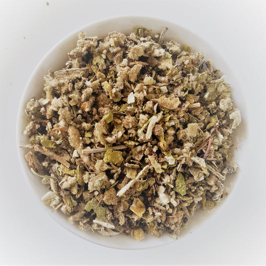 Loose leaf Mullein organic tea in a white bowl.