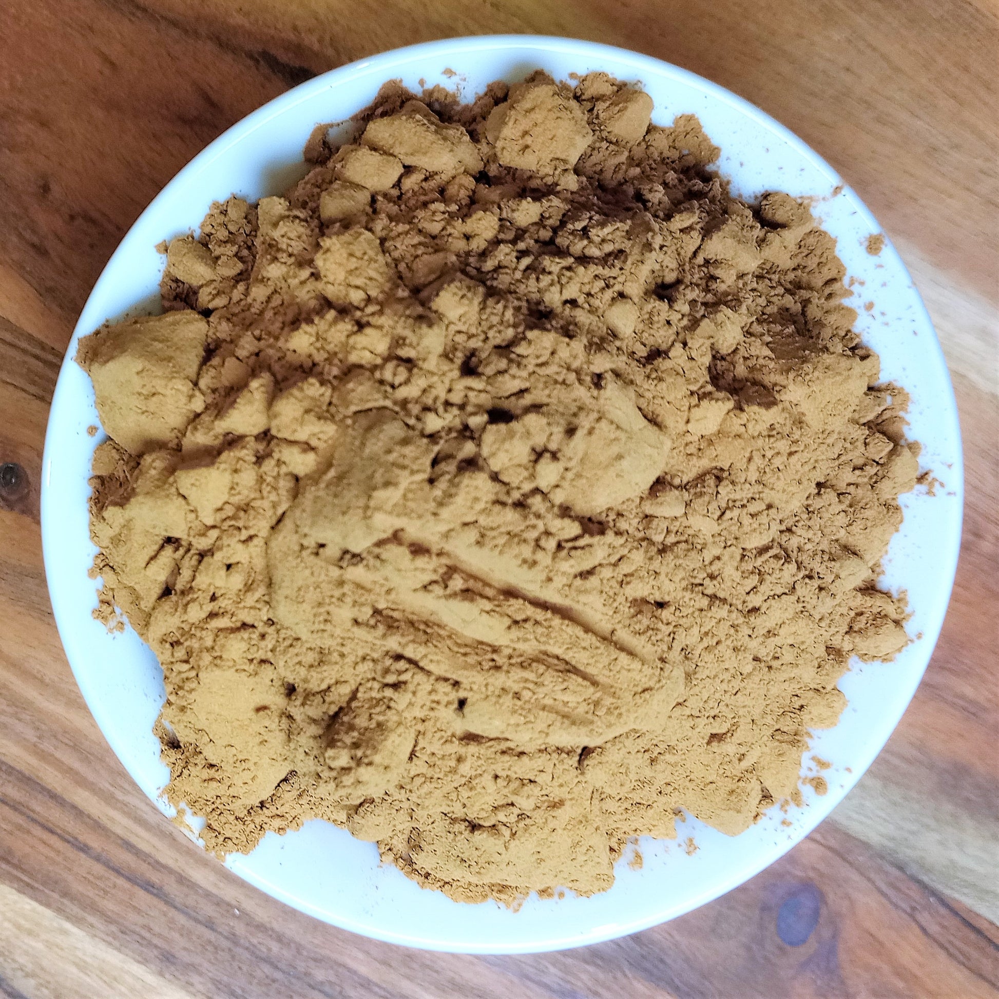 organic carob powder in bowl