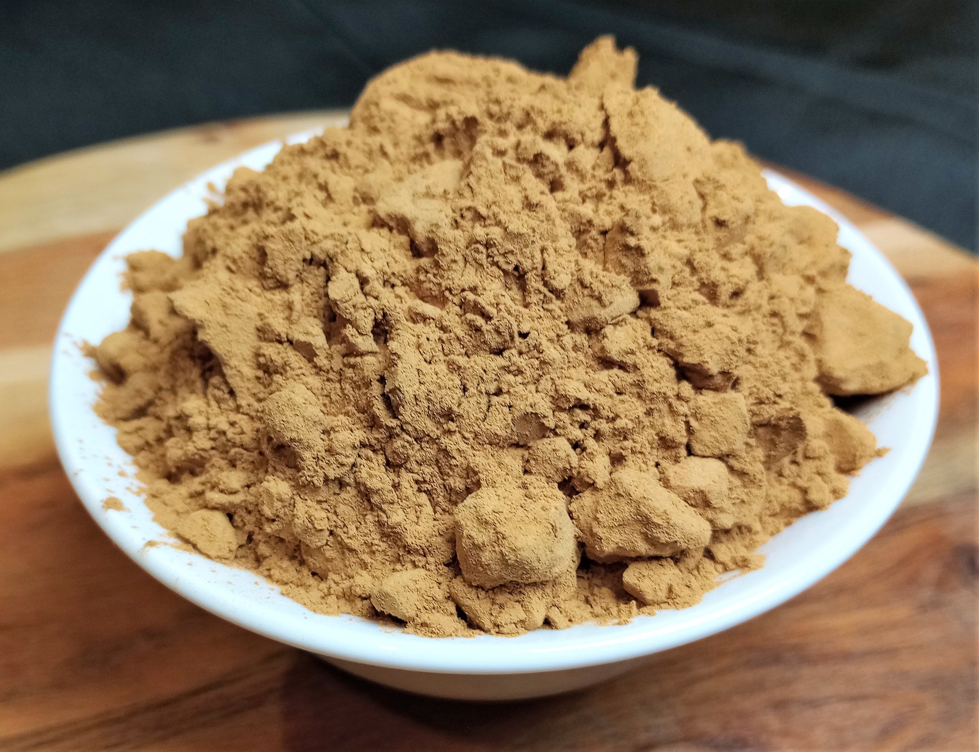 organic carob powder in bowl