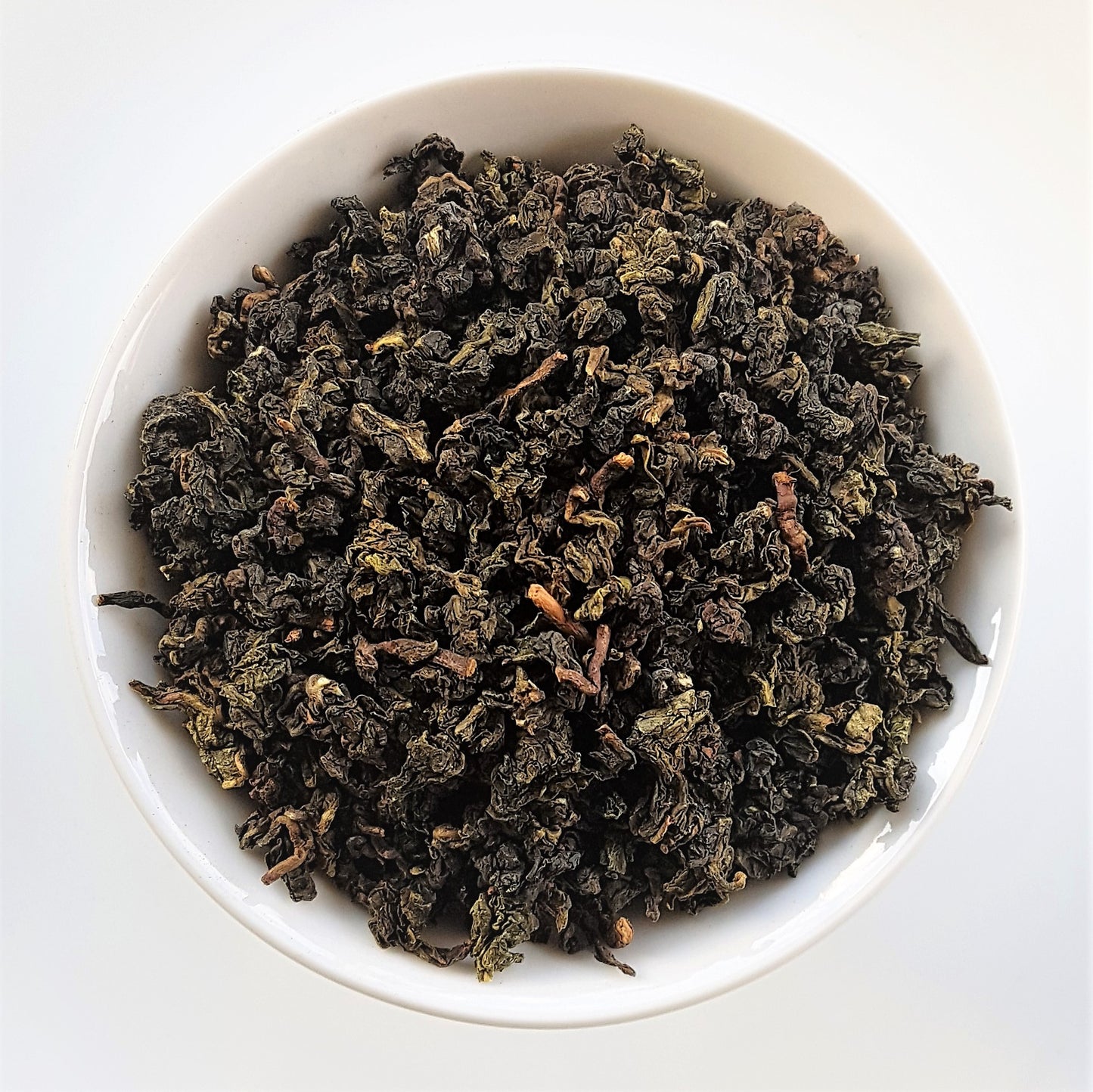 organic oolong iron goddess tea in bowl