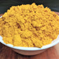 organic turmeric powder in bowl