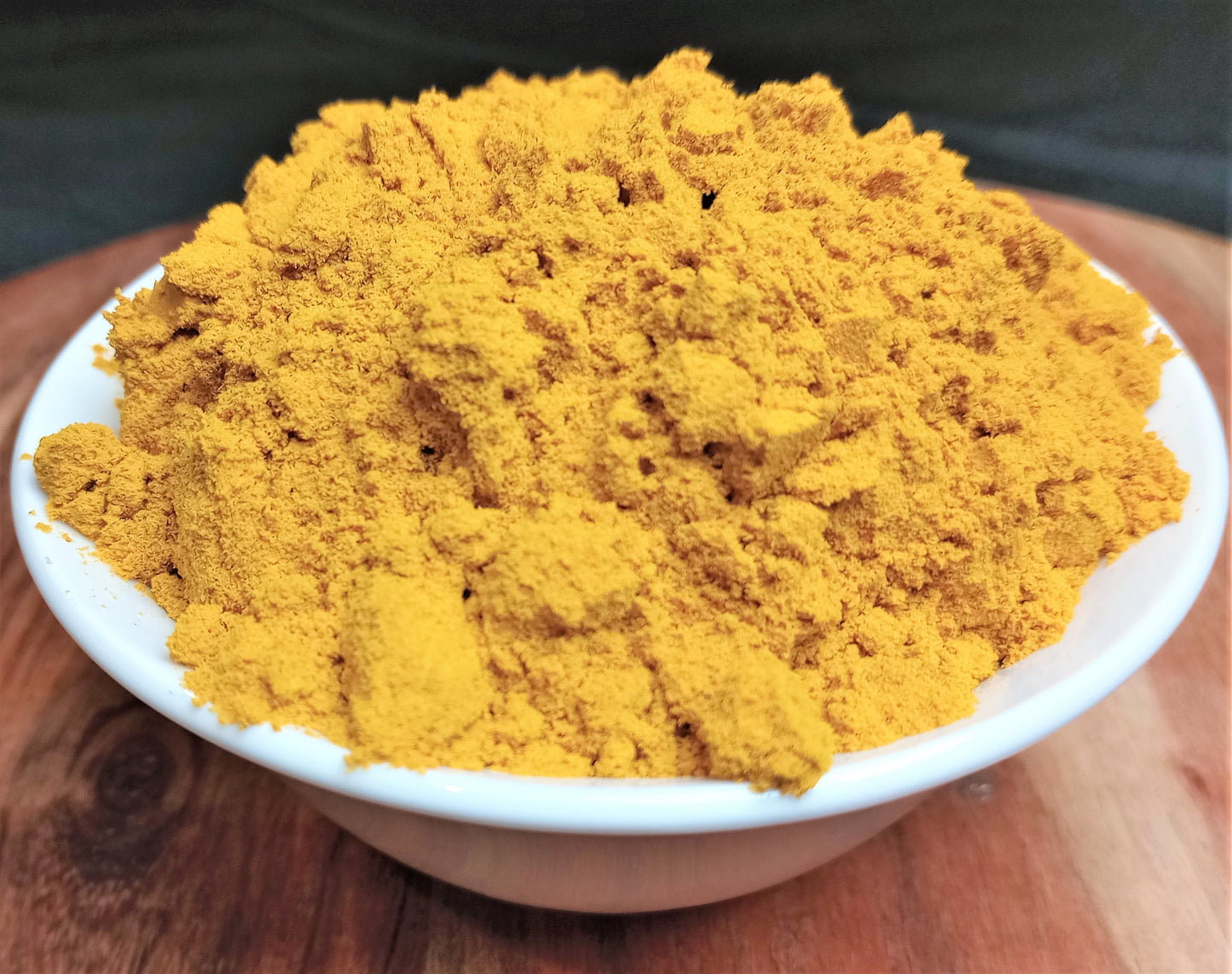 organic turmeric powder in bowl